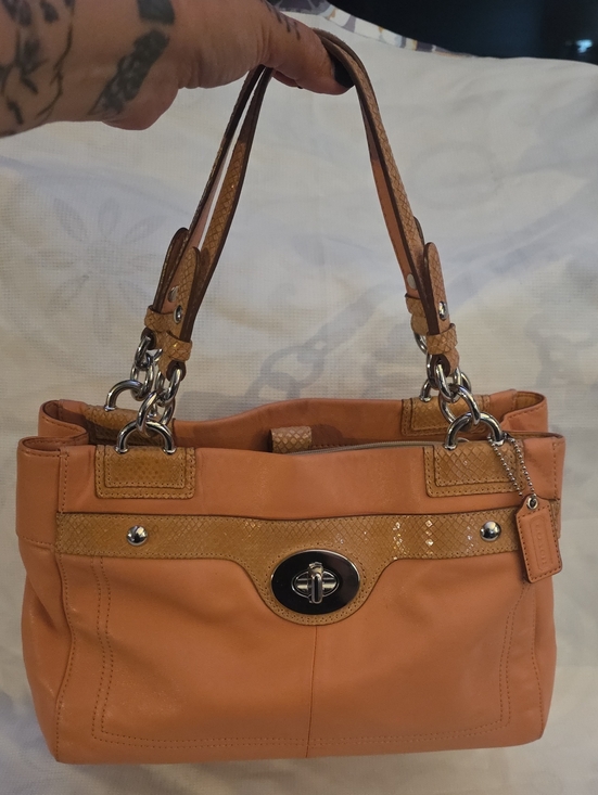 Coach Handbags - Coach Penelope Turn-Lock tote in a coral peach leather with snakeskin Trim